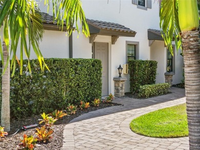 Beautifully maintained End unit condominium. Experience on Esplanade Golf and Country at Lakewood Ranch in Florida - for sale on GolfHomes.com, golf home, golf lot