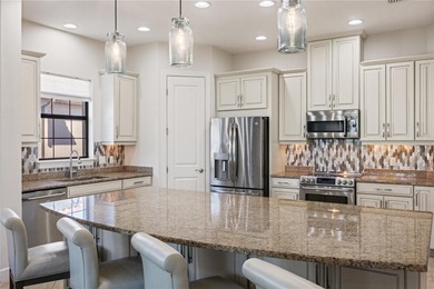 Beautifully maintained End unit condominium. Experience on Esplanade Golf and Country at Lakewood Ranch in Florida - for sale on GolfHomes.com, golf home, golf lot