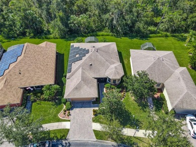 **See the FULL LENGTH VIDEO on Tour Link 1.** Enjoy the Serenity on Stonegate Golf Club in Florida - for sale on GolfHomes.com, golf home, golf lot