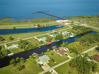 Calling all boaters and fishing enthusiasts! This is the on Indian Lake Estates Golf and Country Club in Florida - for sale on GolfHomes.com, golf home, golf lot