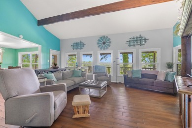 Wake up to stunning water views and a lush, private landscape in on Diamondhead Golf and Country Club in Arkansas - for sale on GolfHomes.com, golf home, golf lot