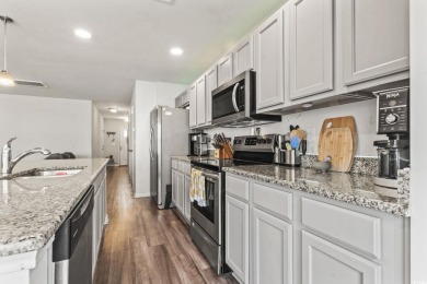 Welcome to this beautifully maintained 3-bedroom, 2.5-bath on Wild Wing Plantation in South Carolina - for sale on GolfHomes.com, golf home, golf lot