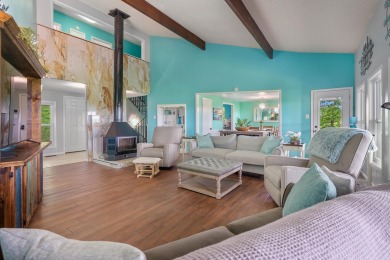 Wake up to stunning water views and a lush, private landscape in on Diamondhead Golf and Country Club in Arkansas - for sale on GolfHomes.com, golf home, golf lot