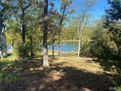 Discover the perfect canvas for your dream home on this stunning on Cottonwood Golf Course in Missouri - for sale on GolfHomes.com, golf home, golf lot