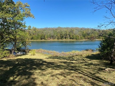 Discover the perfect canvas for your dream home on this stunning on Cottonwood Golf Course in Missouri - for sale on GolfHomes.com, golf home, golf lot