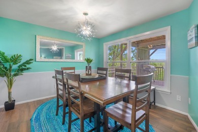 Wake up to stunning water views and a lush, private landscape in on Diamondhead Golf and Country Club in Arkansas - for sale on GolfHomes.com, golf home, golf lot