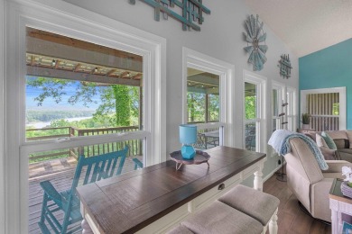Wake up to stunning water views and a lush, private landscape in on Diamondhead Golf and Country Club in Arkansas - for sale on GolfHomes.com, golf home, golf lot