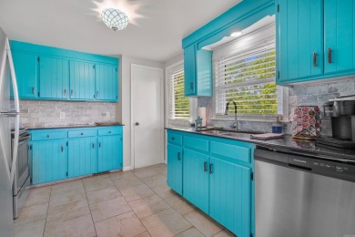 Wake up to stunning water views and a lush, private landscape in on Diamondhead Golf and Country Club in Arkansas - for sale on GolfHomes.com, golf home, golf lot