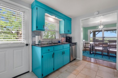 Wake up to stunning water views and a lush, private landscape in on Diamondhead Golf and Country Club in Arkansas - for sale on GolfHomes.com, golf home, golf lot