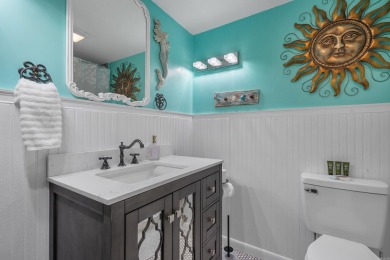 Wake up to stunning water views and a lush, private landscape in on Diamondhead Golf and Country Club in Arkansas - for sale on GolfHomes.com, golf home, golf lot
