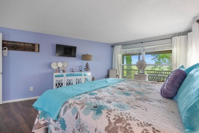 Wake up to stunning water views and a lush, private landscape in on Diamondhead Golf and Country Club in Arkansas - for sale on GolfHomes.com, golf home, golf lot