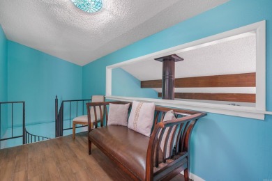 Wake up to stunning water views and a lush, private landscape in on Diamondhead Golf and Country Club in Arkansas - for sale on GolfHomes.com, golf home, golf lot