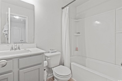 Welcome to this beautifully maintained 3-bedroom, 2.5-bath on Wild Wing Plantation in South Carolina - for sale on GolfHomes.com, golf home, golf lot