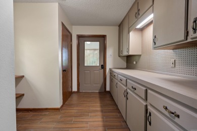Wake up to stunning water views and a lush, private landscape in on Diamondhead Golf and Country Club in Arkansas - for sale on GolfHomes.com, golf home, golf lot