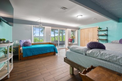 Wake up to stunning water views and a lush, private landscape in on Diamondhead Golf and Country Club in Arkansas - for sale on GolfHomes.com, golf home, golf lot