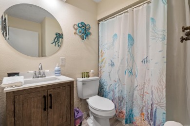 Wake up to stunning water views and a lush, private landscape in on Diamondhead Golf and Country Club in Arkansas - for sale on GolfHomes.com, golf home, golf lot