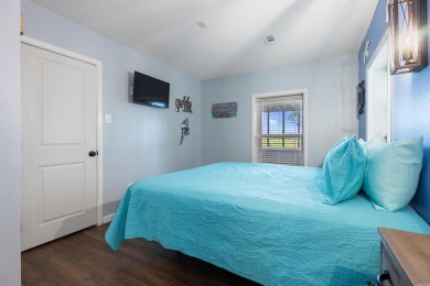 Wake up to stunning water views and a lush, private landscape in on Diamondhead Golf and Country Club in Arkansas - for sale on GolfHomes.com, golf home, golf lot