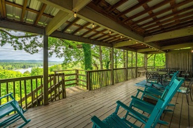 Wake up to stunning water views and a lush, private landscape in on Diamondhead Golf and Country Club in Arkansas - for sale on GolfHomes.com, golf home, golf lot
