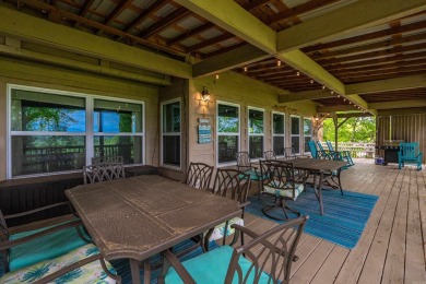 Wake up to stunning water views and a lush, private landscape in on Diamondhead Golf and Country Club in Arkansas - for sale on GolfHomes.com, golf home, golf lot