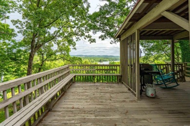 Wake up to stunning water views and a lush, private landscape in on Diamondhead Golf and Country Club in Arkansas - for sale on GolfHomes.com, golf home, golf lot