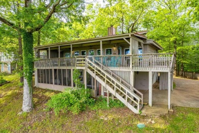 Wake up to stunning water views and a lush, private landscape in on Diamondhead Golf and Country Club in Arkansas - for sale on GolfHomes.com, golf home, golf lot