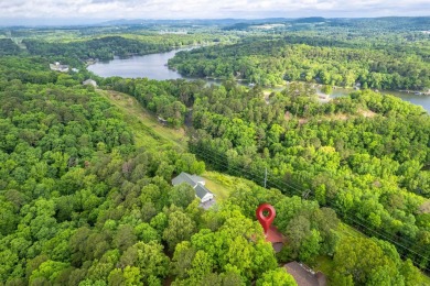 Wake up to stunning water views and a lush, private landscape in on Diamondhead Golf and Country Club in Arkansas - for sale on GolfHomes.com, golf home, golf lot