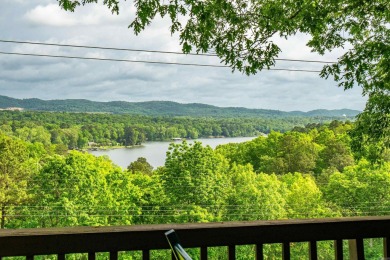 Wake up to stunning water views and a lush, private landscape in on Diamondhead Golf and Country Club in Arkansas - for sale on GolfHomes.com, golf home, golf lot