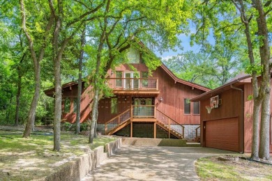 Awesome custom-built 1.5 story Lindal Cedar Home on wooded Golf on Holly Lake Ranch Golf Club in Texas - for sale on GolfHomes.com, golf home, golf lot