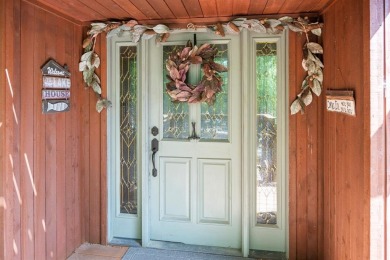 Awesome custom-built 1.5 story Lindal Cedar Home on wooded Golf on Holly Lake Ranch Golf Club in Texas - for sale on GolfHomes.com, golf home, golf lot