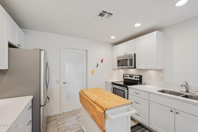 Discover incredible value and modern style in this beautifully on Stardust Golf Course in Arizona - for sale on GolfHomes.com, golf home, golf lot