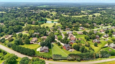 Large and cleared, gently sloping lot in Rock Barn Country Club on Rock Barn Golf and Spa in North Carolina - for sale on GolfHomes.com, golf home, golf lot