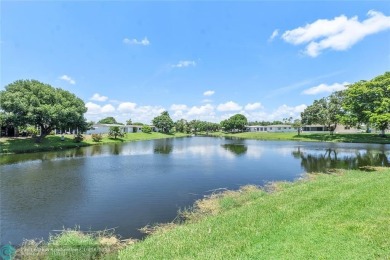 ***THIS PROPETY QUALIFIES FOR BANK OF AMERICA'S DOWN PAYMENT on Oriole Golf and Tennis Club in Florida - for sale on GolfHomes.com, golf home, golf lot