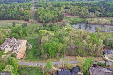 Experience luxury living at its finest in this prestigious on Echelon Golf Club in Georgia - for sale on GolfHomes.com, golf home, golf lot
