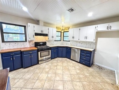 Welcome to lake life in Taylor Ferry! This super quiet on Sequoyah State Park Golf Course in Oklahoma - for sale on GolfHomes.com, golf home, golf lot