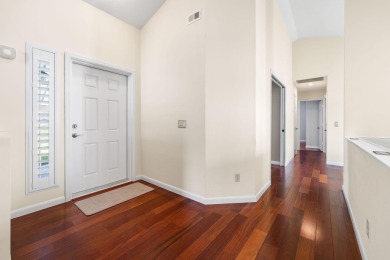 Enjoy peaceful lake views from this well-maintained 3-bedroom on Heritage Ridge Golf Club in Florida - for sale on GolfHomes.com, golf home, golf lot