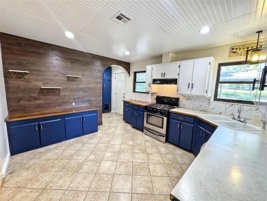 Welcome to lake life in Taylor Ferry! This super quiet on Sequoyah State Park Golf Course in Oklahoma - for sale on GolfHomes.com, golf home, golf lot