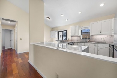 Enjoy peaceful lake views from this well-maintained 3-bedroom on Heritage Ridge Golf Club in Florida - for sale on GolfHomes.com, golf home, golf lot