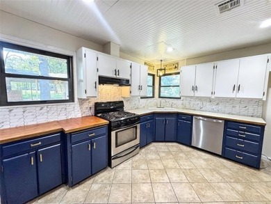 Welcome to lake life in Taylor Ferry! This super quiet on Sequoyah State Park Golf Course in Oklahoma - for sale on GolfHomes.com, golf home, golf lot