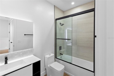 Experience contemporary living in this BRAND-NEW 2025 two-story on Saint Andrews South Golf Club in Florida - for sale on GolfHomes.com, golf home, golf lot