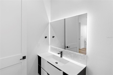 Experience contemporary living in this BRAND-NEW 2025 two-story on Saint Andrews South Golf Club in Florida - for sale on GolfHomes.com, golf home, golf lot