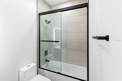 Experience contemporary living in this BRAND-NEW 2025 two-story on Saint Andrews South Golf Club in Florida - for sale on GolfHomes.com, golf home, golf lot