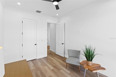 Experience contemporary living in this BRAND-NEW 2025 two-story on Saint Andrews South Golf Club in Florida - for sale on GolfHomes.com, golf home, golf lot