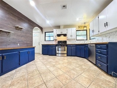 Welcome to lake life in Taylor Ferry! This super quiet on Sequoyah State Park Golf Course in Oklahoma - for sale on GolfHomes.com, golf home, golf lot