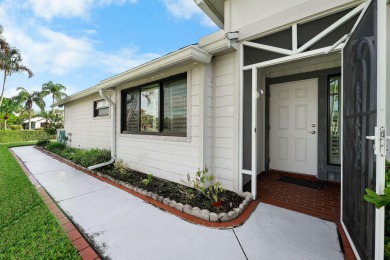 Enjoy peaceful lake views from this well-maintained 3-bedroom on Heritage Ridge Golf Club in Florida - for sale on GolfHomes.com, golf home, golf lot