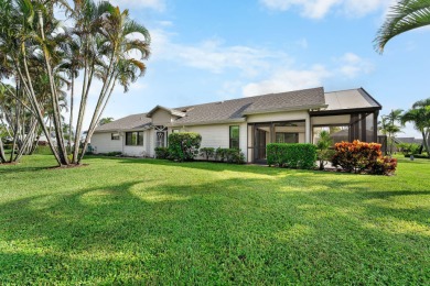 Enjoy peaceful lake views from this well-maintained 3-bedroom on Heritage Ridge Golf Club in Florida - for sale on GolfHomes.com, golf home, golf lot