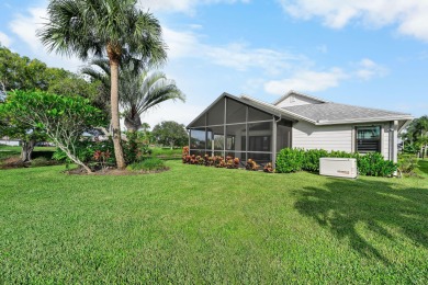 Enjoy peaceful lake views from this well-maintained 3-bedroom on Heritage Ridge Golf Club in Florida - for sale on GolfHomes.com, golf home, golf lot