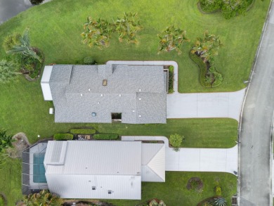 Enjoy peaceful lake views from this well-maintained 3-bedroom on Heritage Ridge Golf Club in Florida - for sale on GolfHomes.com, golf home, golf lot