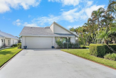 Enjoy peaceful lake views from this well-maintained 3-bedroom on Heritage Ridge Golf Club in Florida - for sale on GolfHomes.com, golf home, golf lot