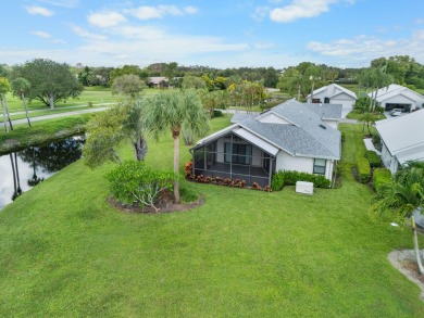 Enjoy peaceful lake views from this well-maintained 3-bedroom on Heritage Ridge Golf Club in Florida - for sale on GolfHomes.com, golf home, golf lot