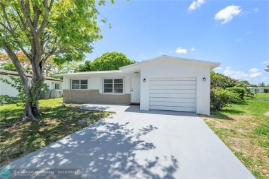 ***THIS PROPETY QUALIFIES FOR BANK OF AMERICA'S DOWN PAYMENT on Oriole Golf and Tennis Club in Florida - for sale on GolfHomes.com, golf home, golf lot